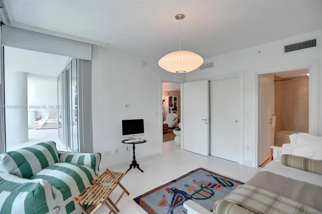 a view of a room with a large window