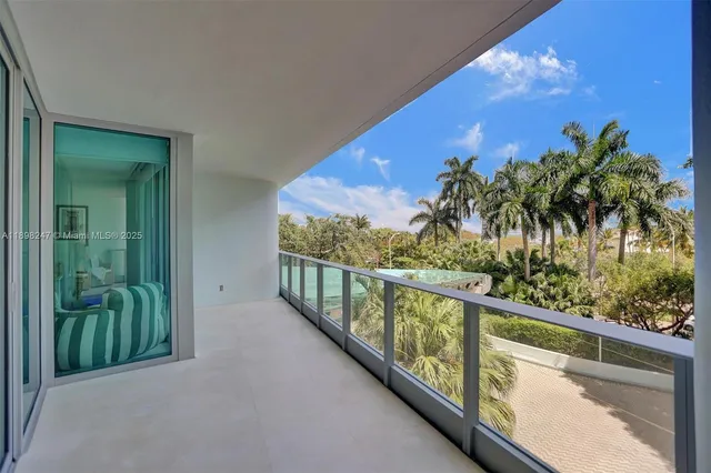 a view of hall way with furniture