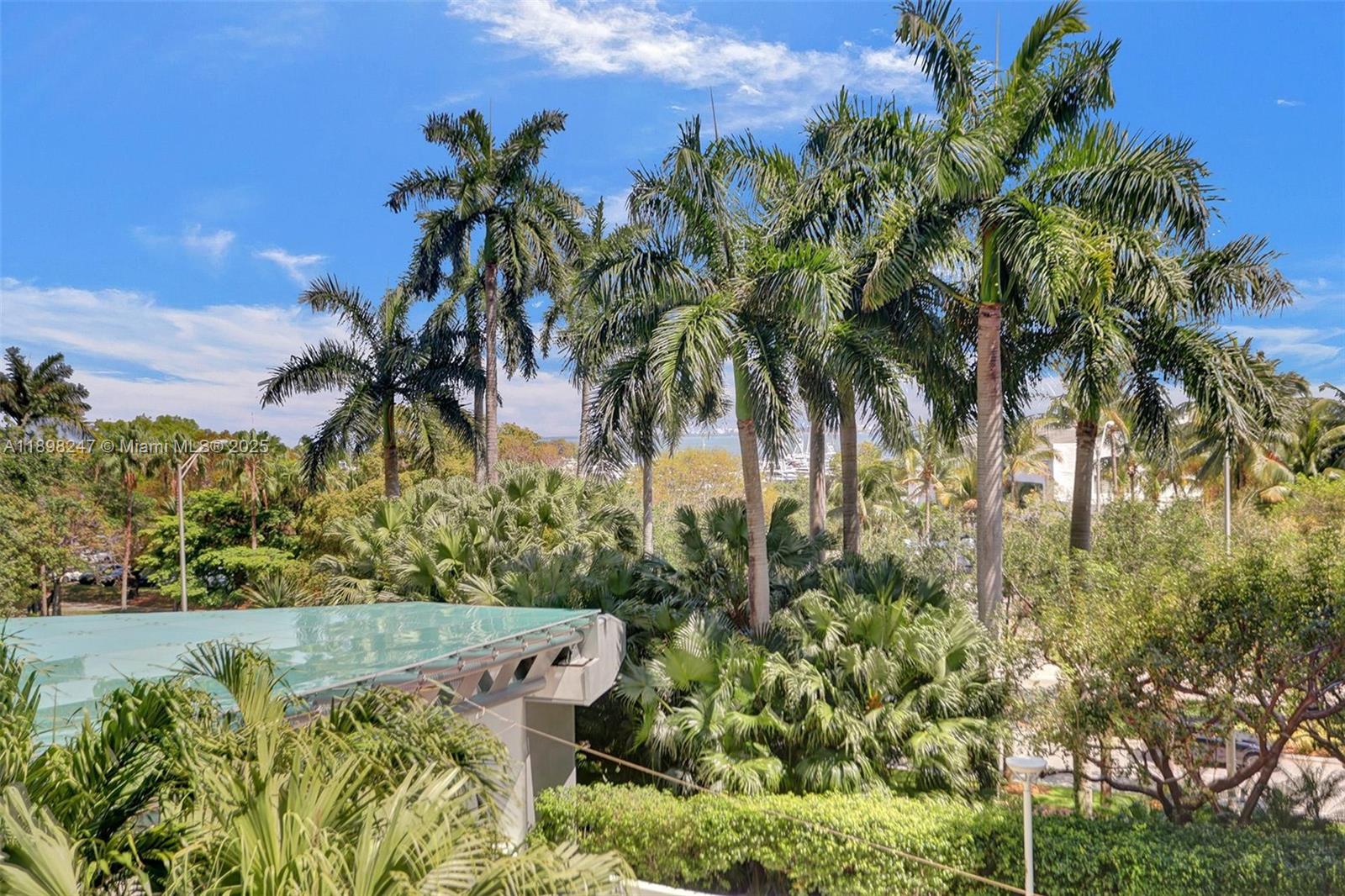 2627 South Bayshore Drive, Unit 506 Coconut Grove, FL 33133 - Photo 39 of 61 a view of a yard