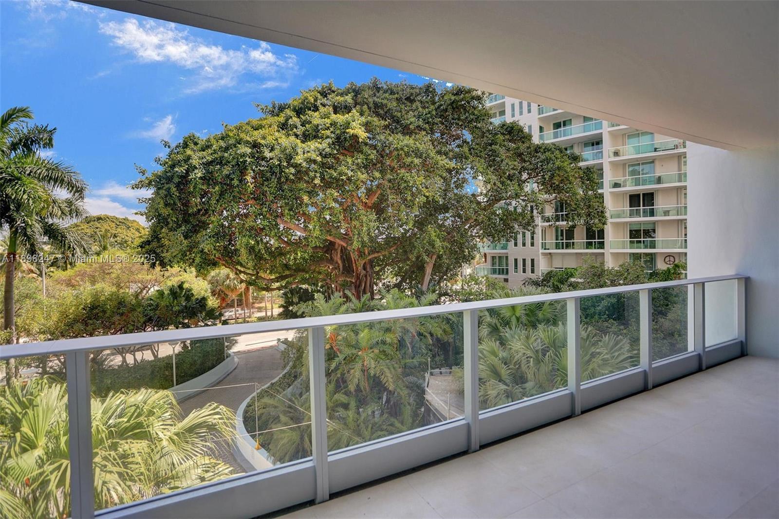 2627 South Bayshore Drive, Unit 506 Coconut Grove, FL 33133 - Photo 42 of 61 a view of a balcony with outdoor space