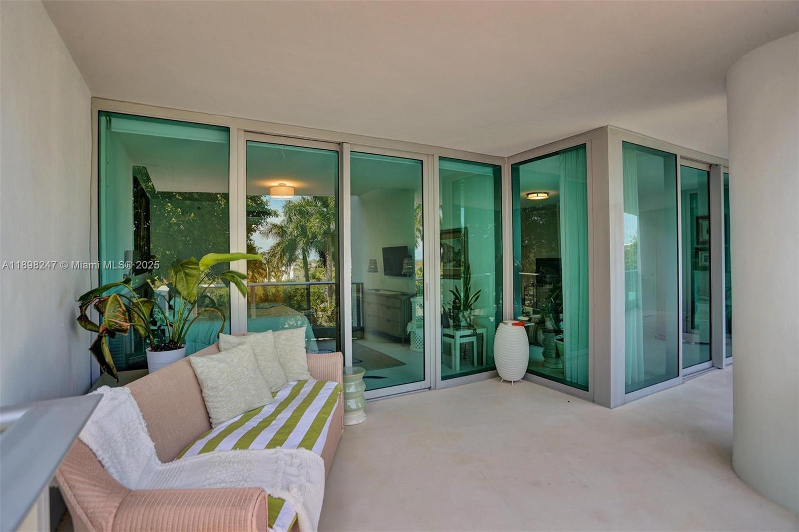 2627 South Bayshore Drive, Unit 506 Coconut Grove, FL 33133 - Photo 45 of 61 a house view with a seating space