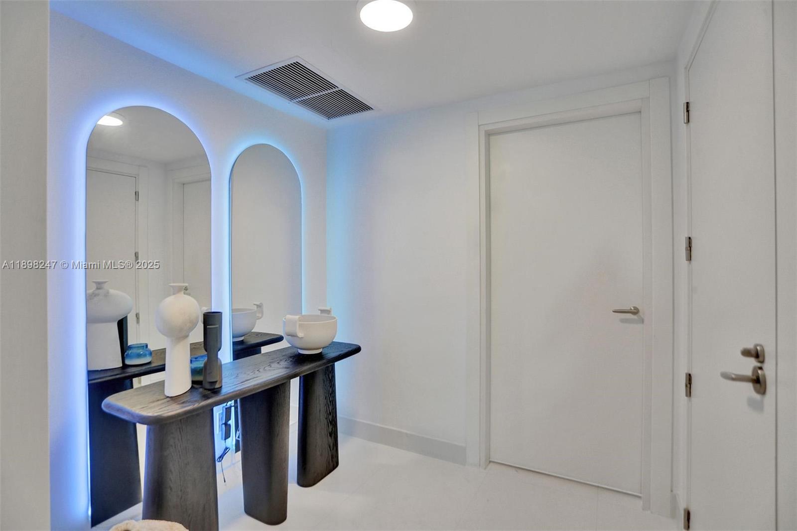 2627 South Bayshore Drive, Unit 506 Coconut Grove, FL 33133 - Photo 46 of 61 a view of hall way with furniture