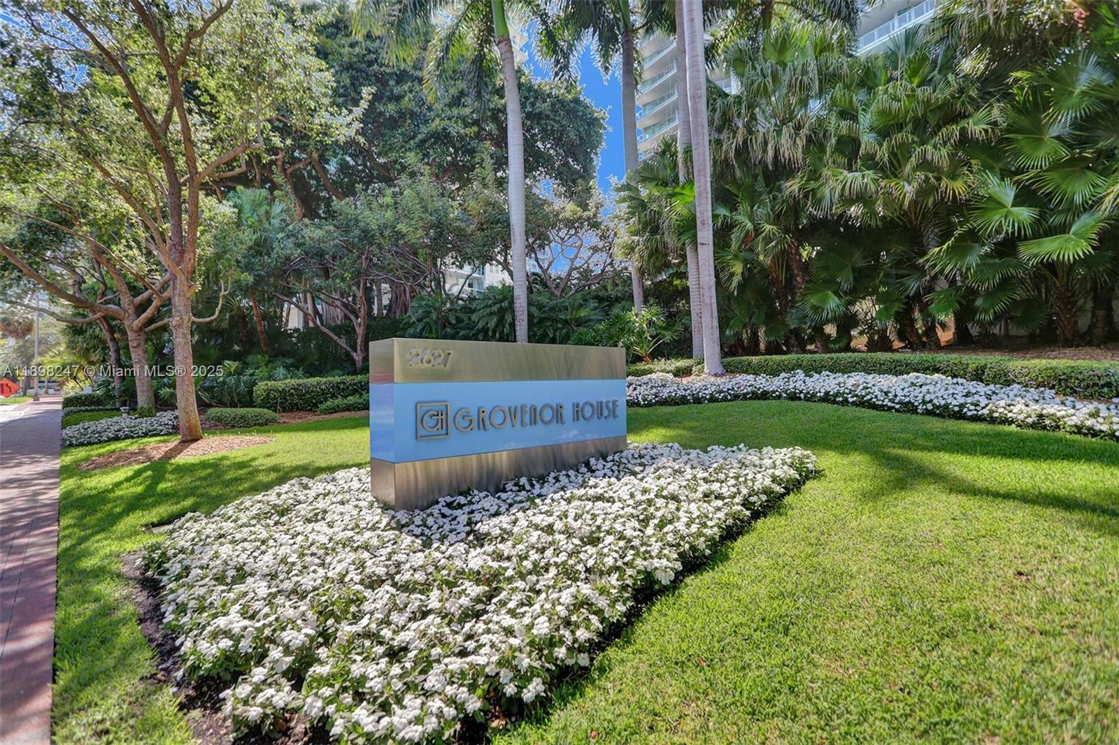 2627 South Bayshore Drive, Unit 506 Coconut Grove, FL 33133 - Photo 47 of 61 a view of a garden with swimming pool