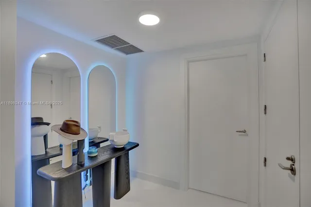 a view of entryway with livingroom