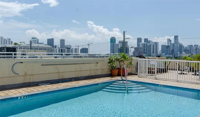 a view of a city with tall buildings