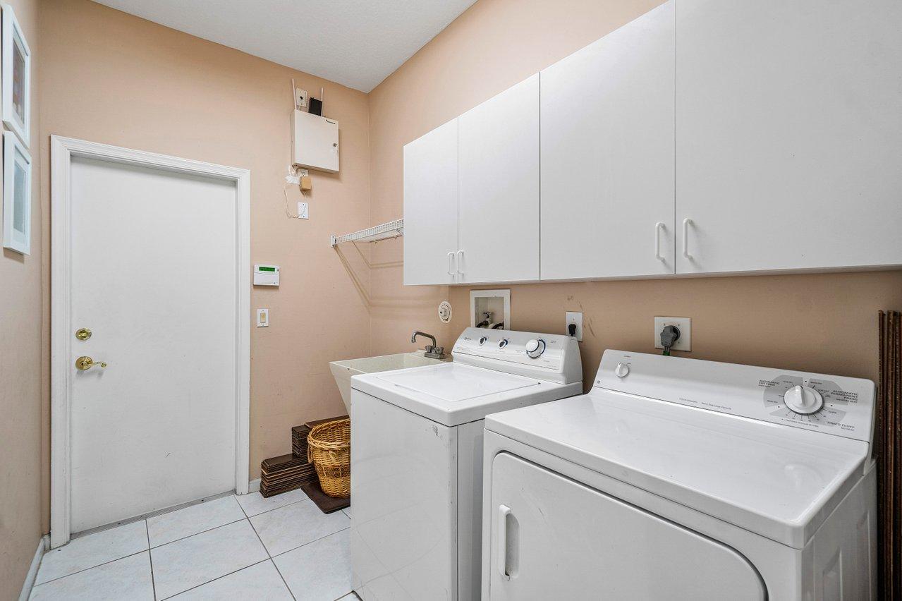 12222 Rockledge Circle Boca Raton, FL 33428 - Photo 13 of 33 Inside Utility Room