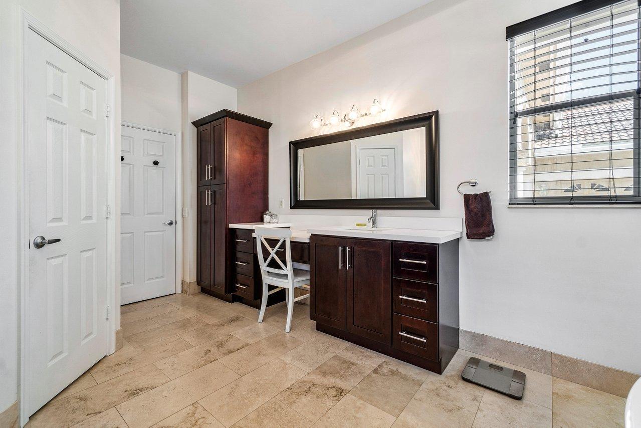 12222 Rockledge Circle Boca Raton, FL 33428 - Photo 24 of 33 Wood Vanities & Extra Linen Storage
