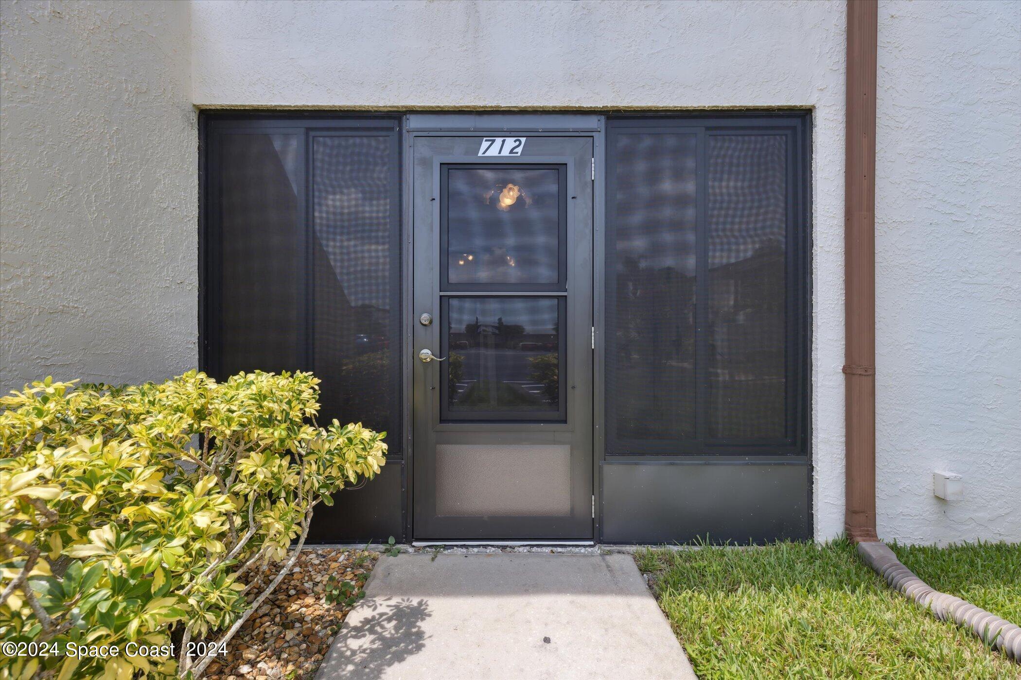 712 Ridge Club Drive Melbourne, FL 32934 - Photo 17 of 32 a front view of a house