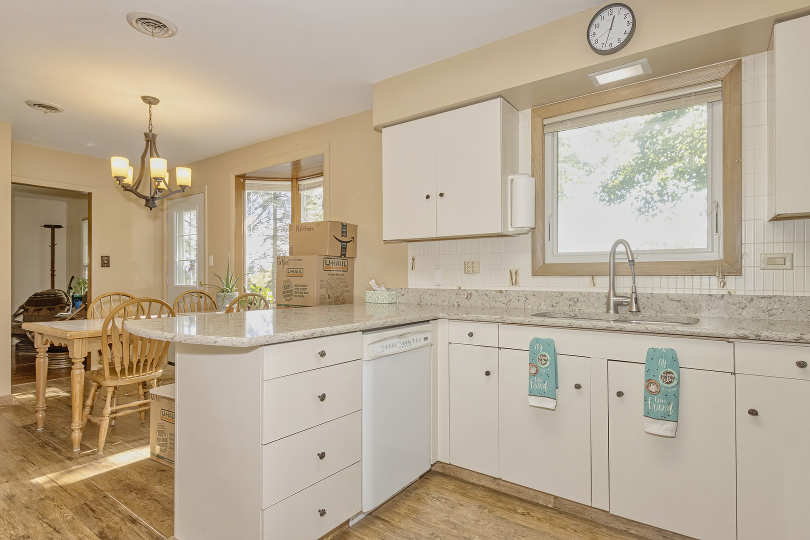 3511 West Gracy Road McHenry, IL 60050 - Photo 11 of 49 a kitchen with lots of counter space and windows