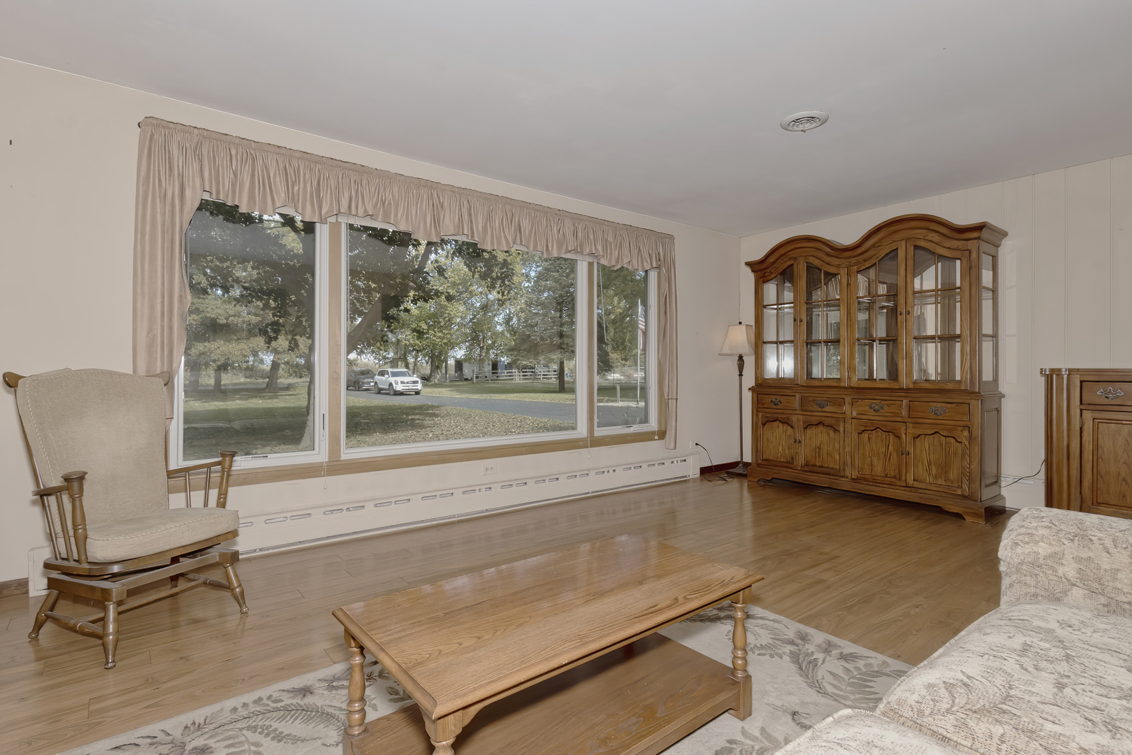 3511 West Gracy Road McHenry, IL 60050 - Photo 14 of 49 a living room with furniture and a large window