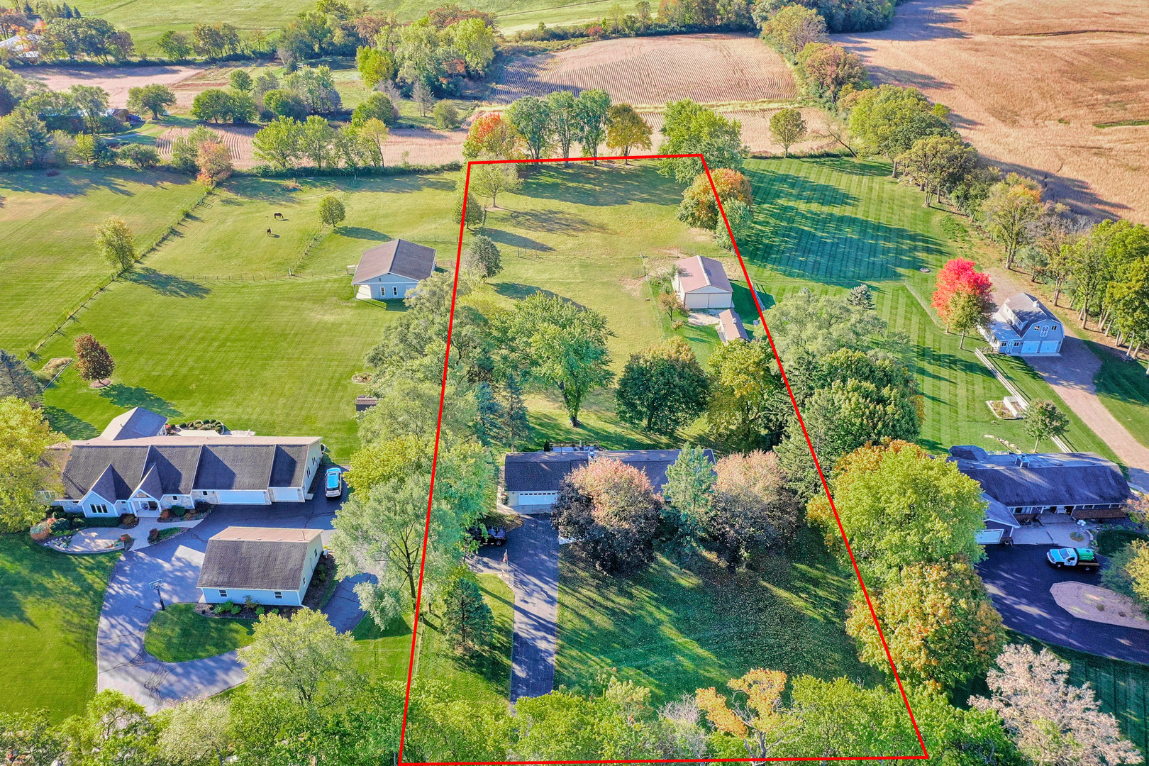 3511 West Gracy Road McHenry, IL 60050 - Photo 2 of 49 an aerial view of residential houses with outdoor space and swimming pool