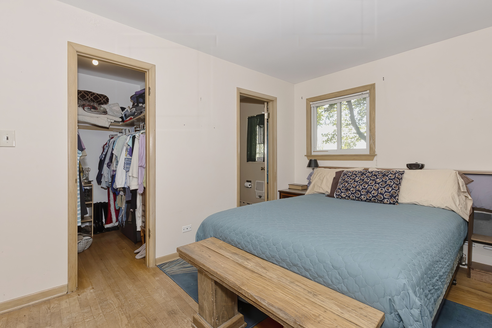 3511 West Gracy Road McHenry, IL 60050 - Photo 21 of 49 a bedroom with a bed and a window