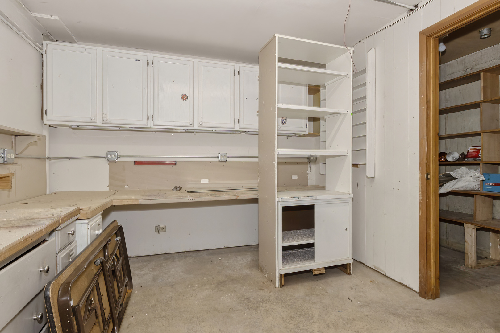 3511 West Gracy Road McHenry, IL 60050 - Photo 31 of 49 a view of cabinets a sink and a stove in a room