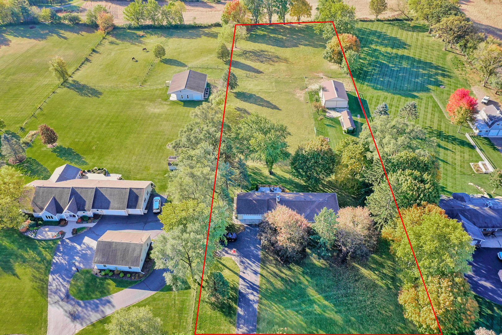 3511 West Gracy Road McHenry, IL 60050 - Photo 44 of 49 an aerial view of residential houses with outdoor space and swimming pool