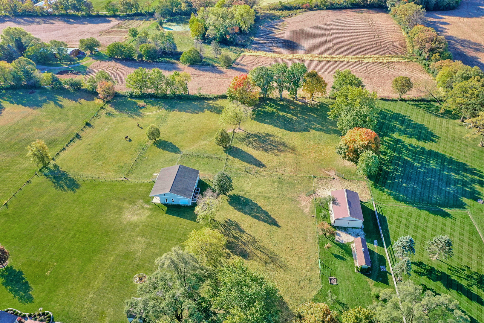 3511 West Gracy Road McHenry, IL 60050 - Photo 45 of 49 an aerial view of residential houses with outdoor space and swimming pool