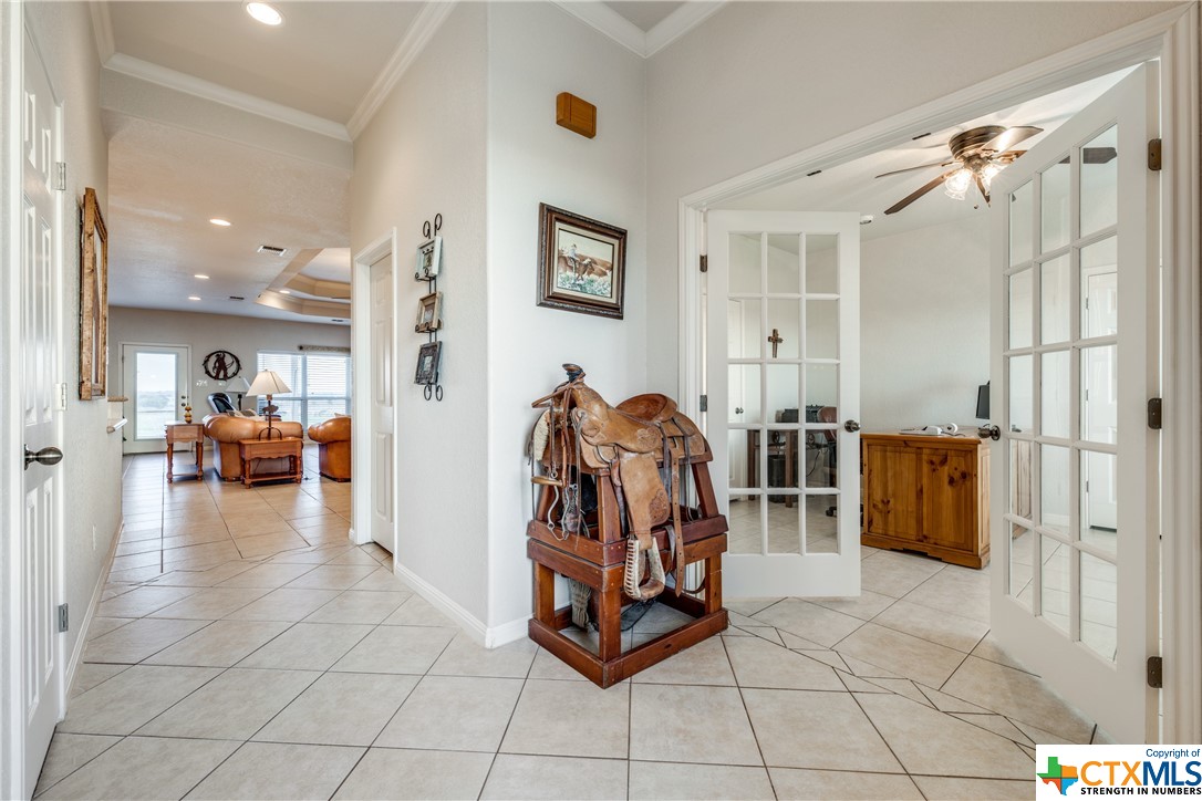 8177 Boenig Road Seguin, TX 78155 - Photo 14 of 21 a living room with furniture and a chandelier