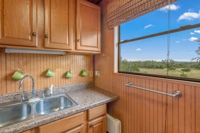 a view closed with a sink and dishwasher