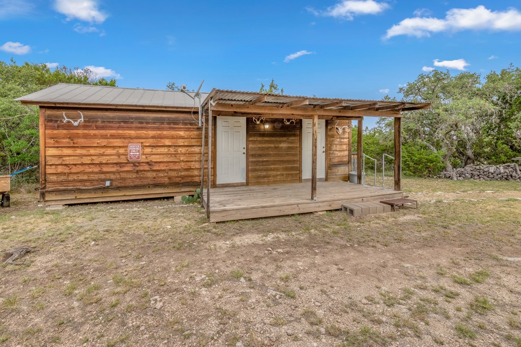 932 Shin Oak Road Menard, TX 76859 - Photo 15 of 23 a view of a house with a garage