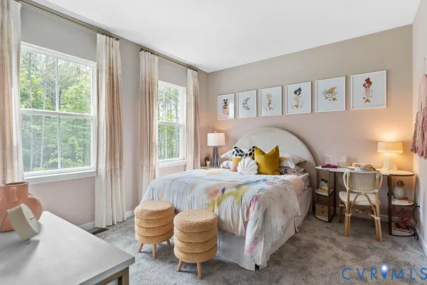 a bed room with a bed and a window