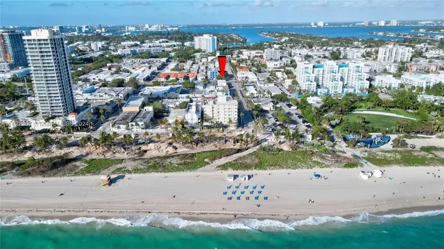 a view of entryway with stairs and wooden floor