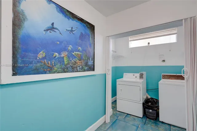 a bed room with a bed and a television