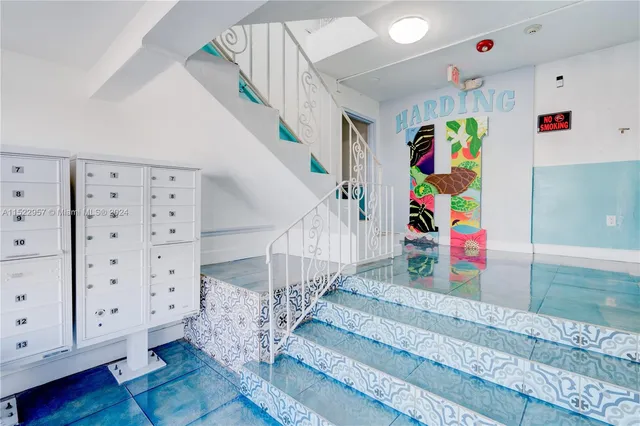 a kitchen with a refrigerator and sink