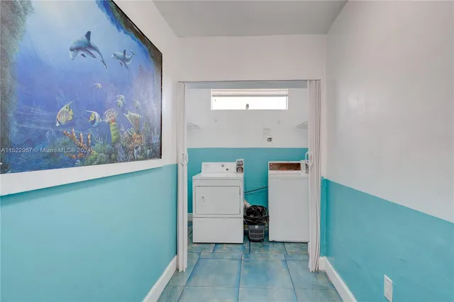 a large white bed in a white room