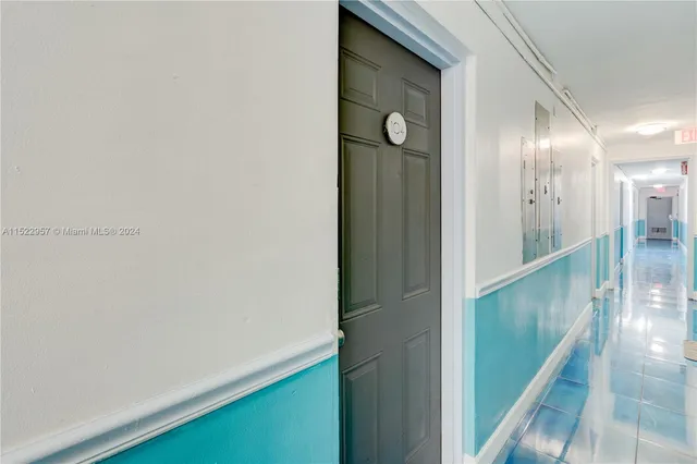 a room with furniture and a potted plant