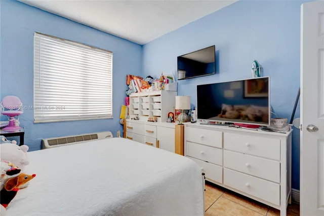 a kitchen with stainless steel appliances granite countertop a sink stove and microwave