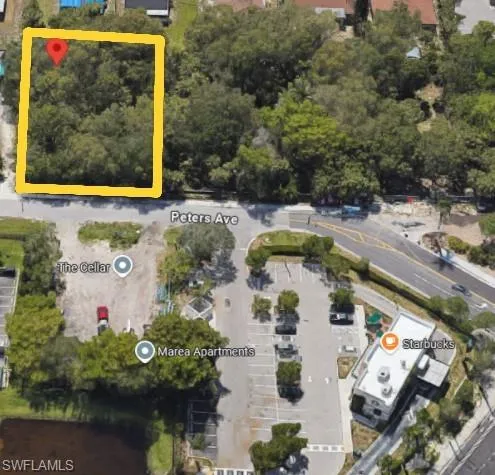 a aerial view of a house with swimming pool and outdoor space