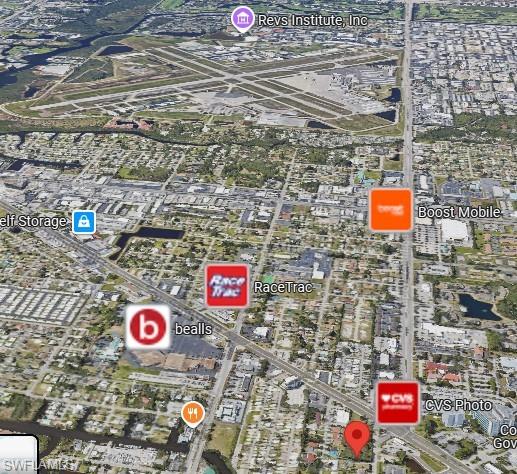 2964 Peters Avenue Naples, FL 34112 - Photo 9 of 12 a sign that is on the wall