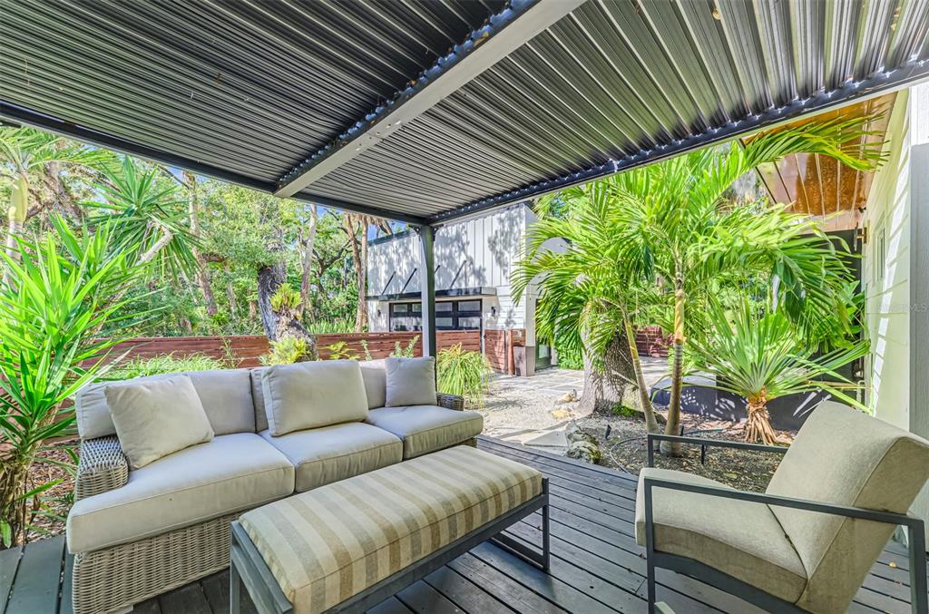 5303 Hidden Harbor Road Sarasota, FL 34242 - Photo 6 of 72 a outdoor living space with furniture