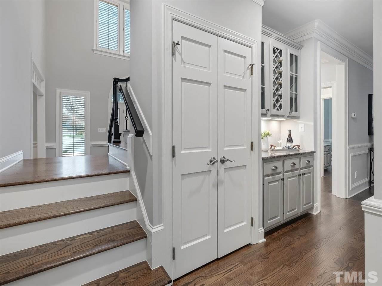 104 Beech Slope Way Cary, NC 27518 - Photo 12 of 30 a view of a kitchen with cabinets and wooden floor