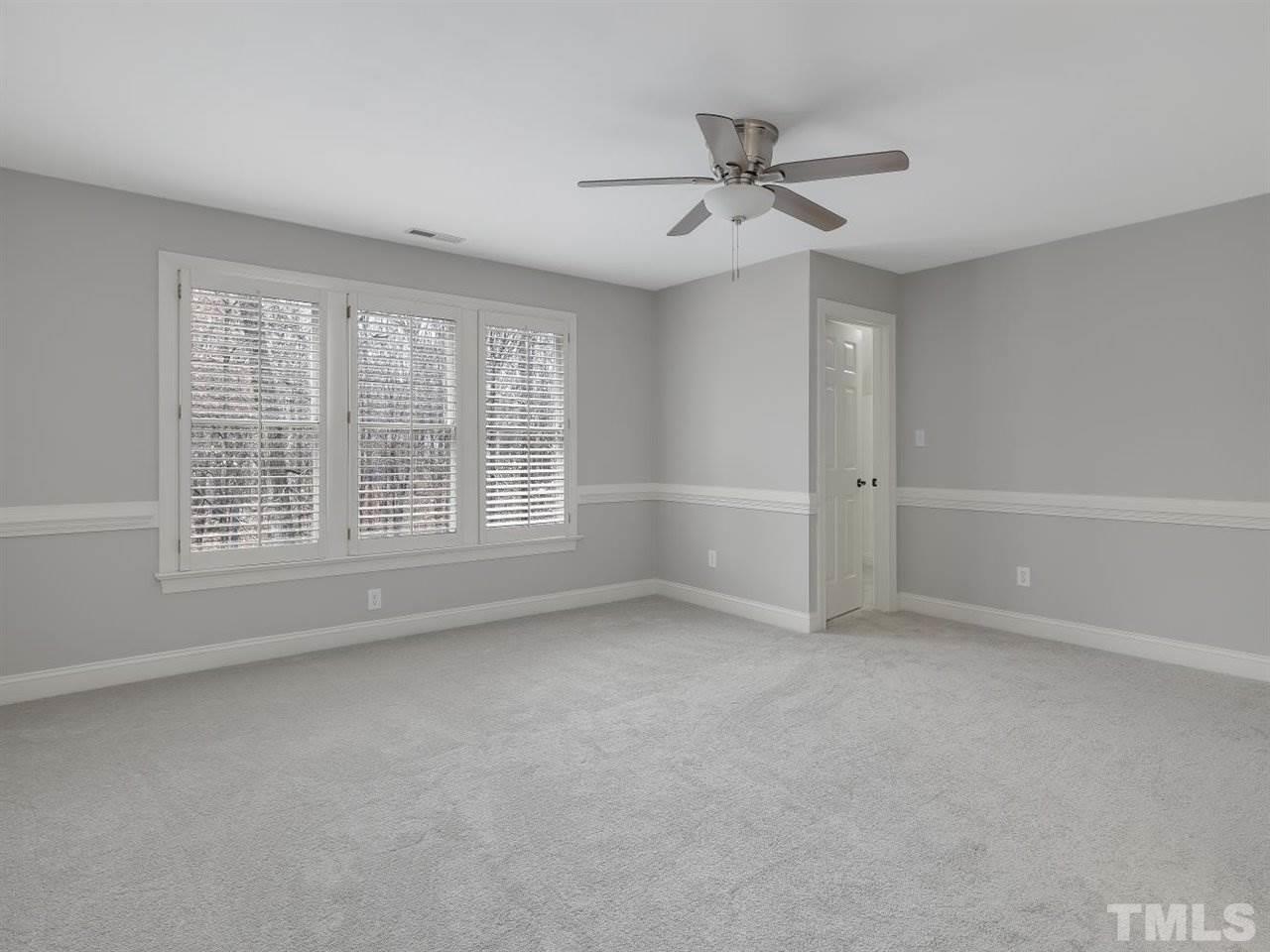 104 Beech Slope Way Cary, NC 27518 - Photo 23 of 30 a view of an empty room with a window