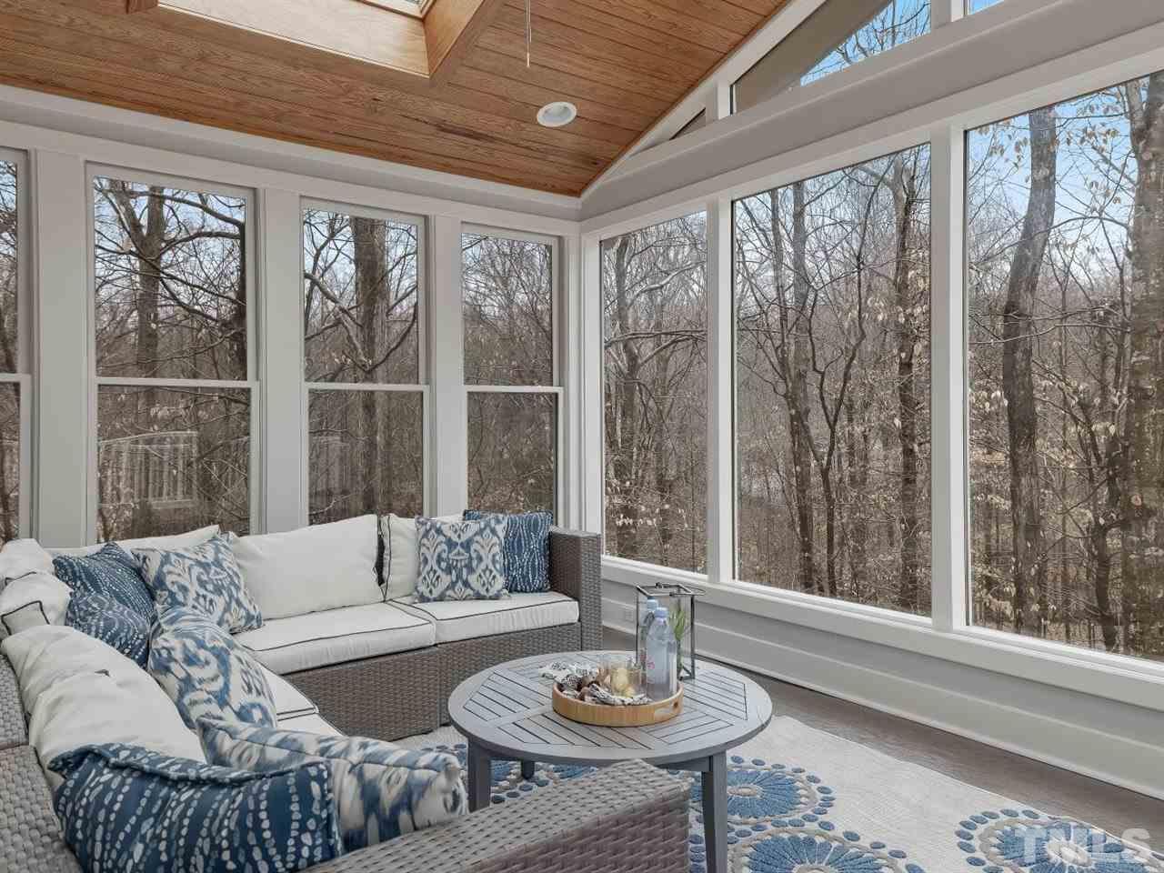 104 Beech Slope Way Cary, NC 27518 - Photo 24 of 30 a living room with furniture and a table