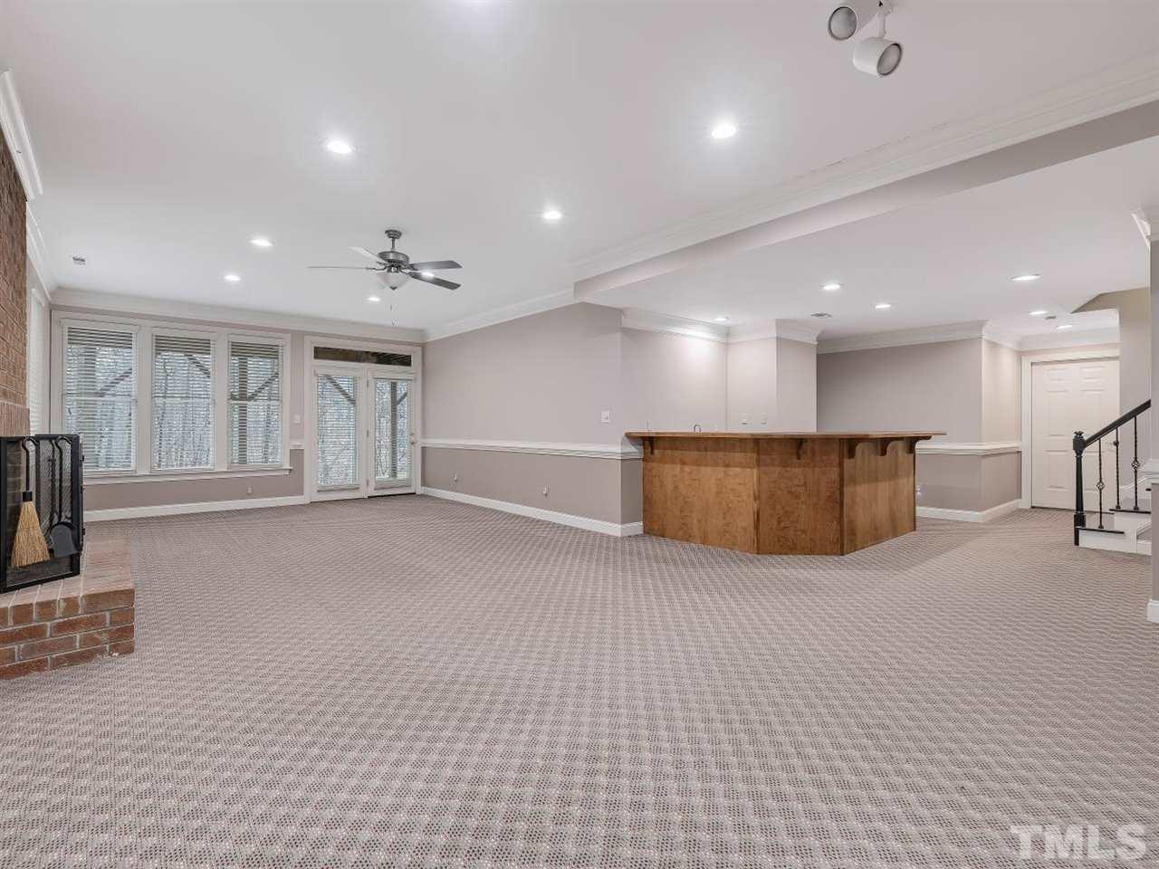 104 Beech Slope Way Cary, NC 27518 - Photo 25 of 30 a view of an empty room with a window