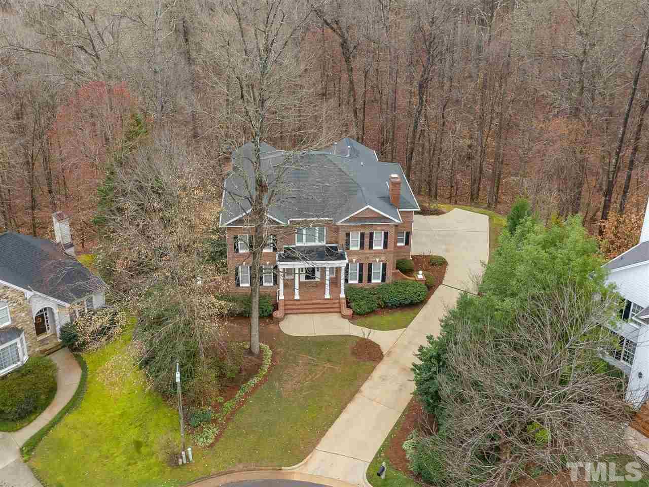 104 Beech Slope Way Cary, NC 27518 - Photo 28 of 30 a view of house with yard swimming pool and outdoor seating
