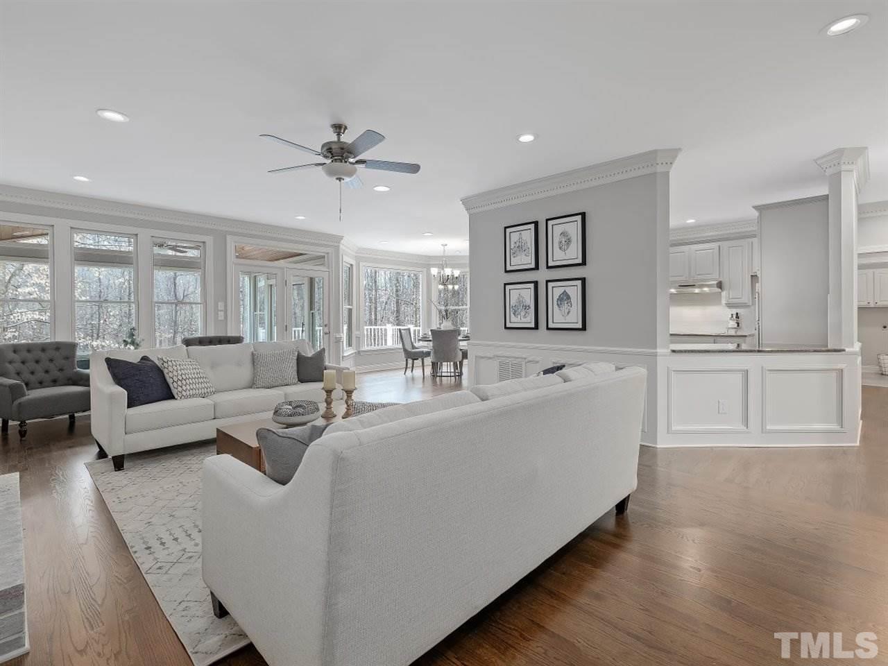 104 Beech Slope Way Cary, NC 27518 - Photo 7 of 30 a living room with furniture and wooden floor