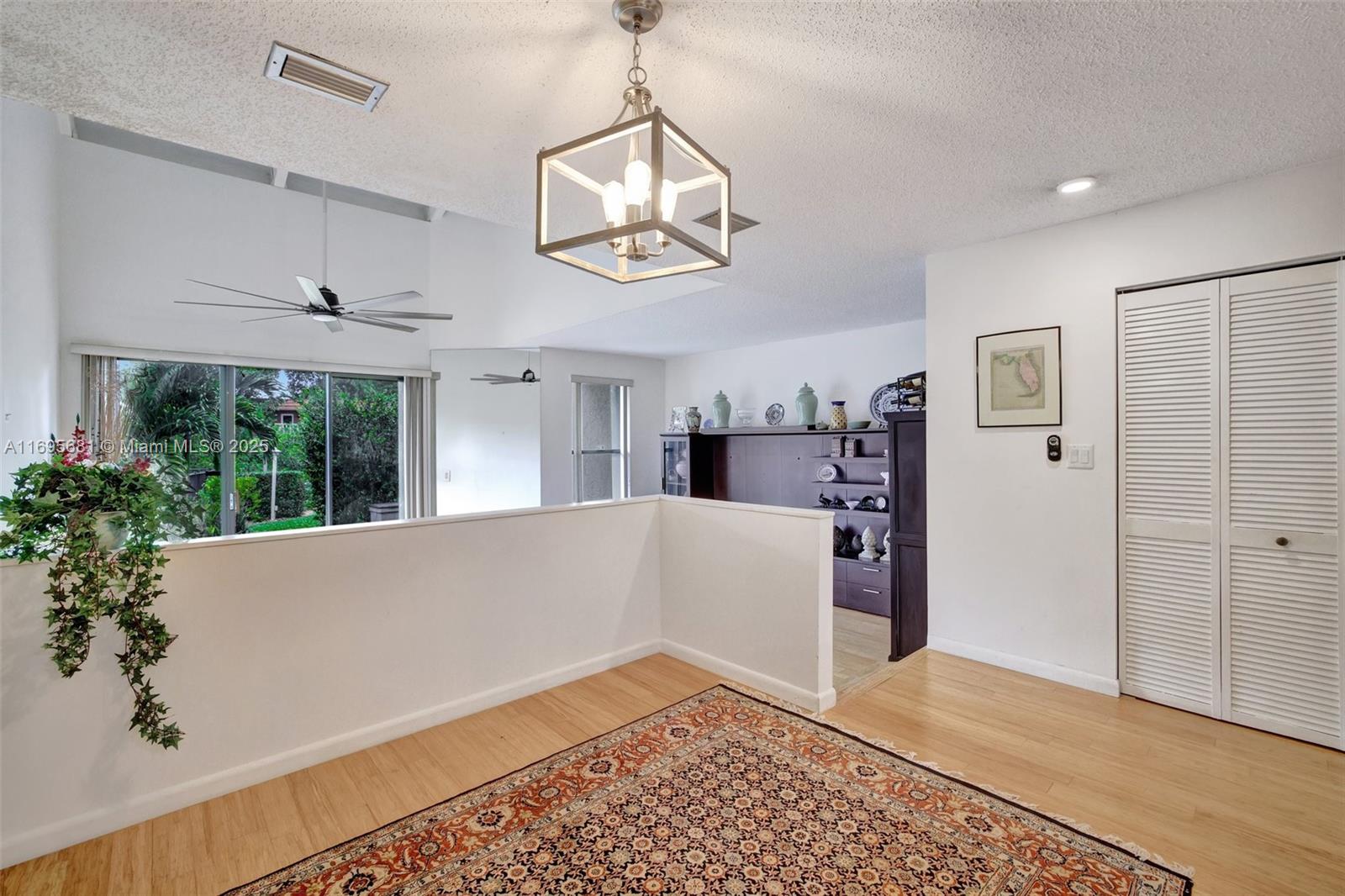 93 Northeast 17th Court, Unit 93 Fort Lauderdale, FL 33305 - Photo 7 of 43 a view of a livingroom with a potted plant