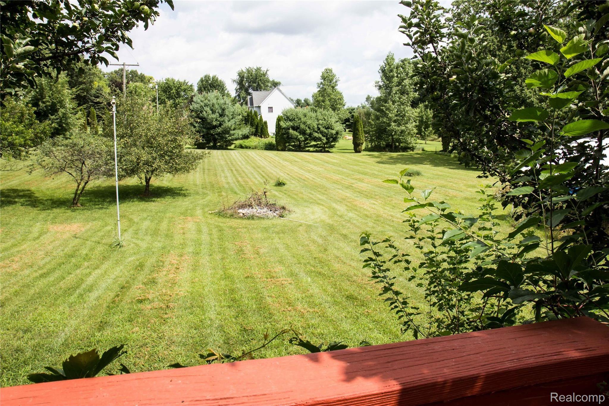 5600 West Coon Lake Road Howell, MI 48843 - Photo 13 of 22 backyard.jpg