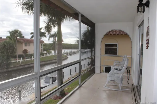 a view of a living room with a large window