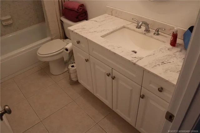 a bathroom with a sink and toilet