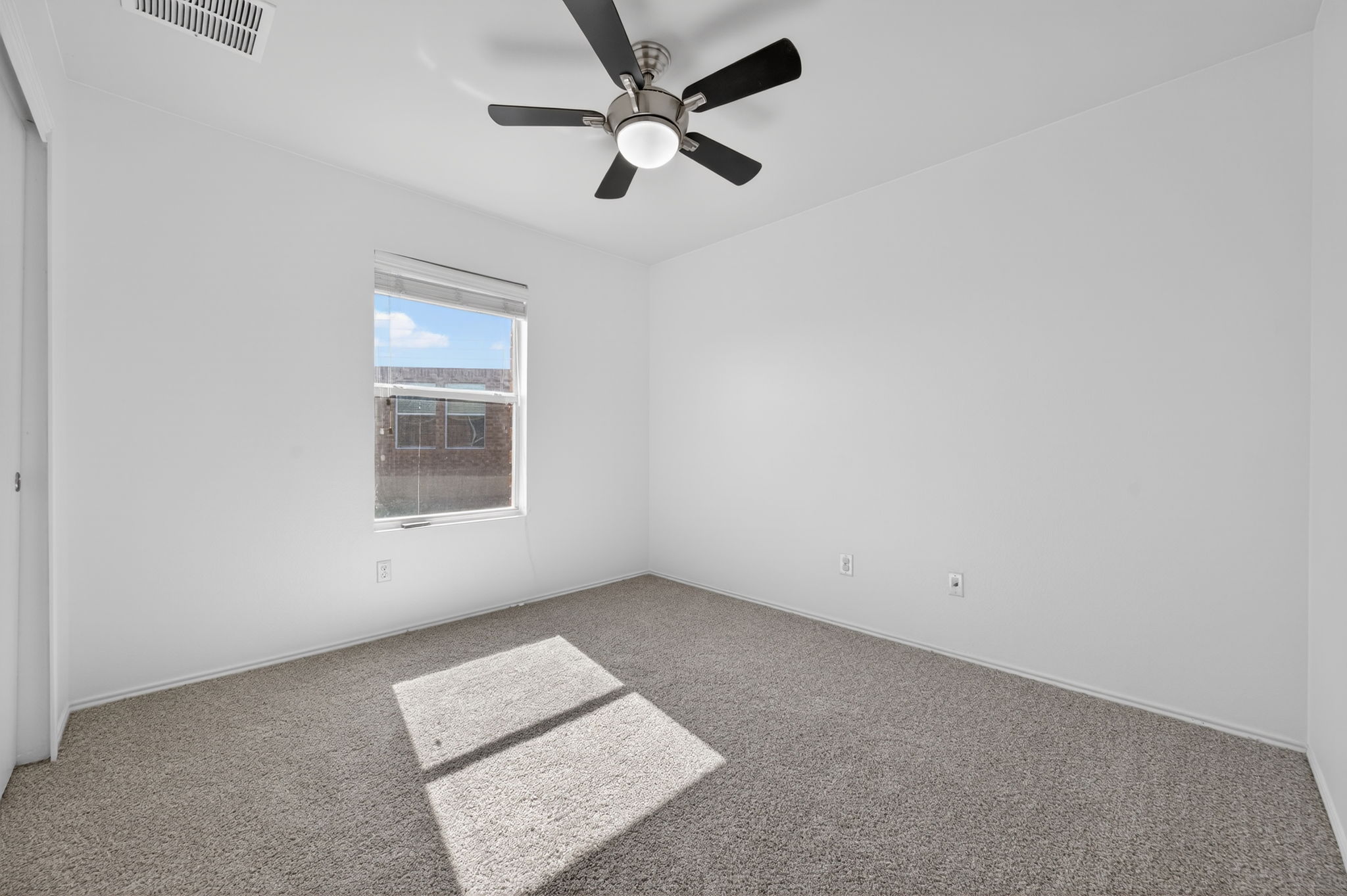 13629 Coomer Path Pflugerville, TX 78660 - Photo 20 of 30 Carpeted spare room featuring ceiling fan and baseboards