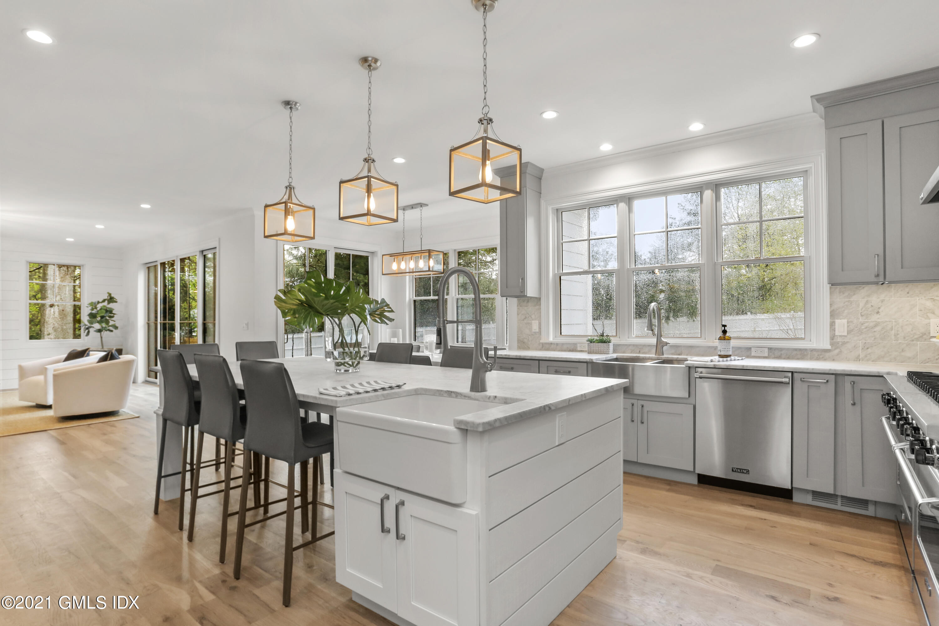 12 Cottontail Road Cos Cob, CT 06807 - Photo 11 of 35 a kitchen with stainless steel appliances granite countertop a stove and a wooden floors