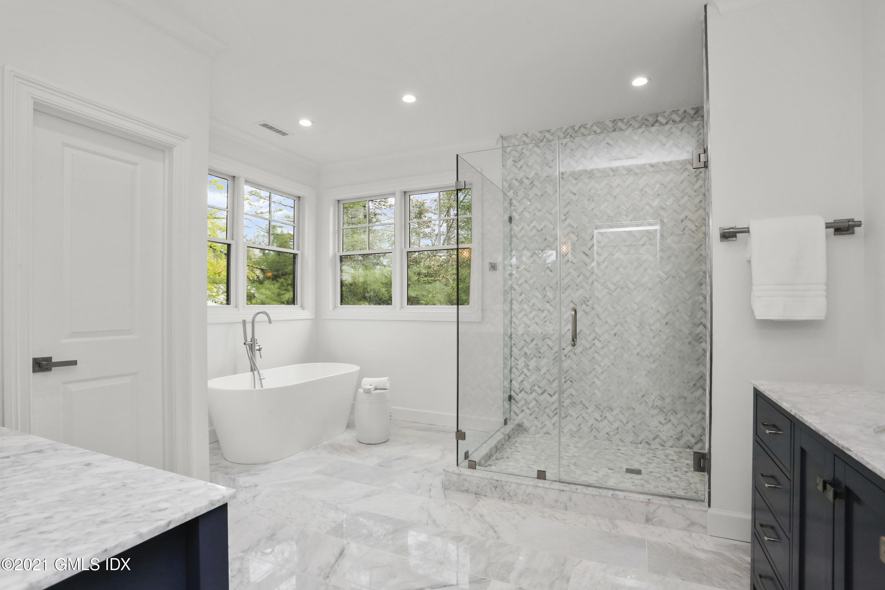 12 Cottontail Road Cos Cob, CT 06807 - Photo 16 of 35 a spacious bathroom with a granite countertop sink a toilet and shower
