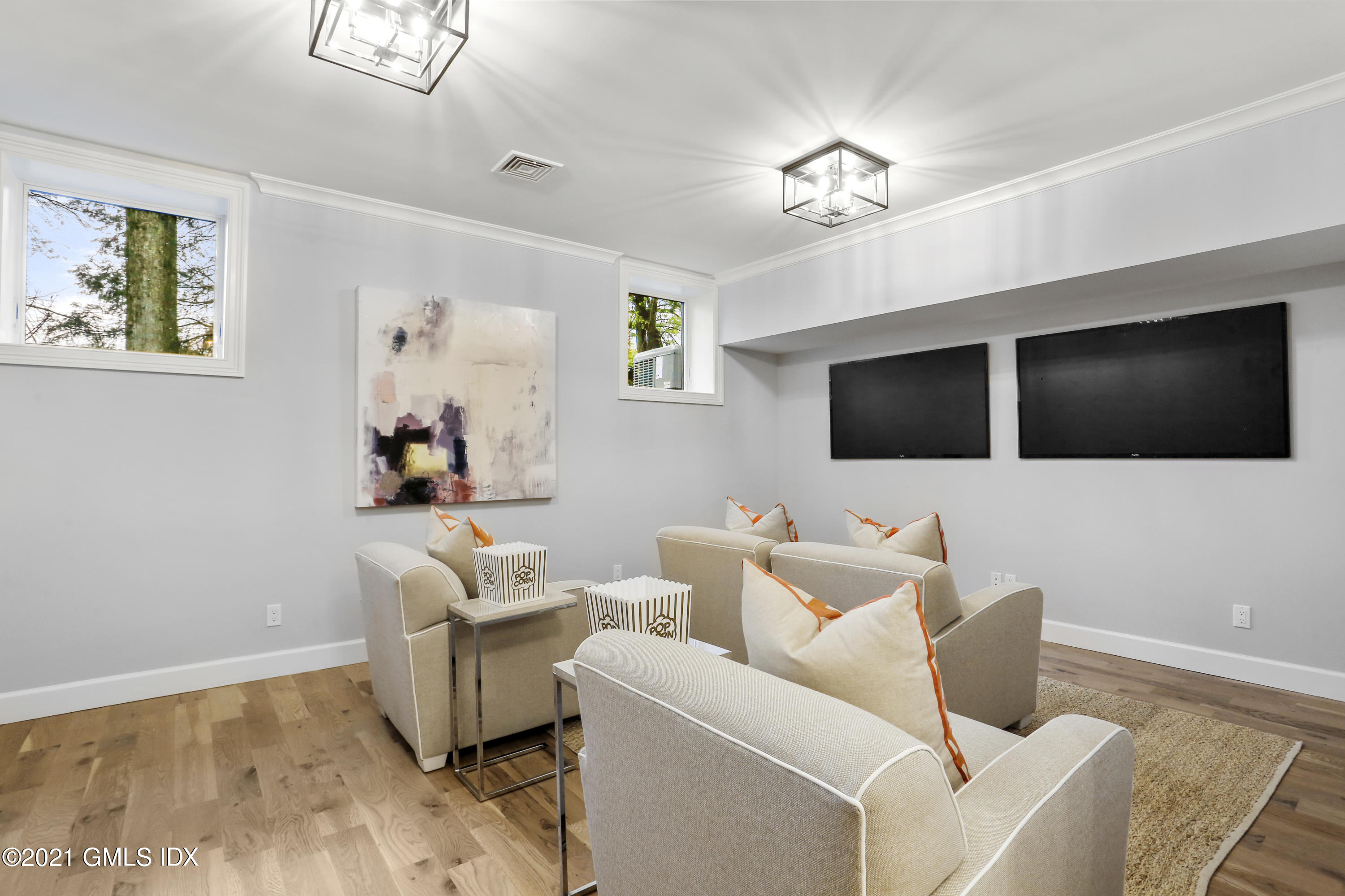 12 Cottontail Road Cos Cob, CT 06807 - Photo 18 of 35 a living room with furniture and a flat screen tv