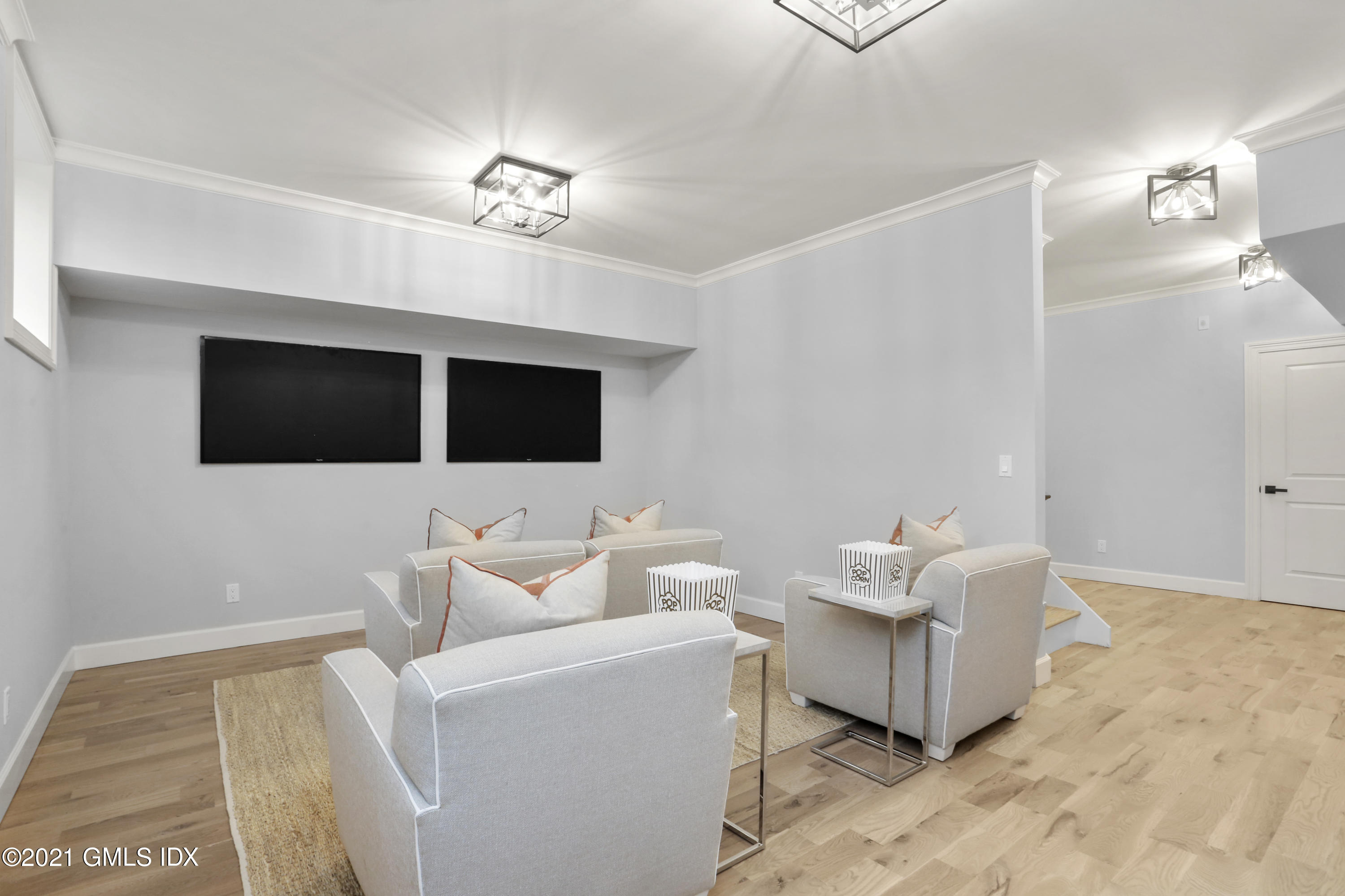 12 Cottontail Road Cos Cob, CT 06807 - Photo 19 of 35 a living room with furniture and a flat screen tv