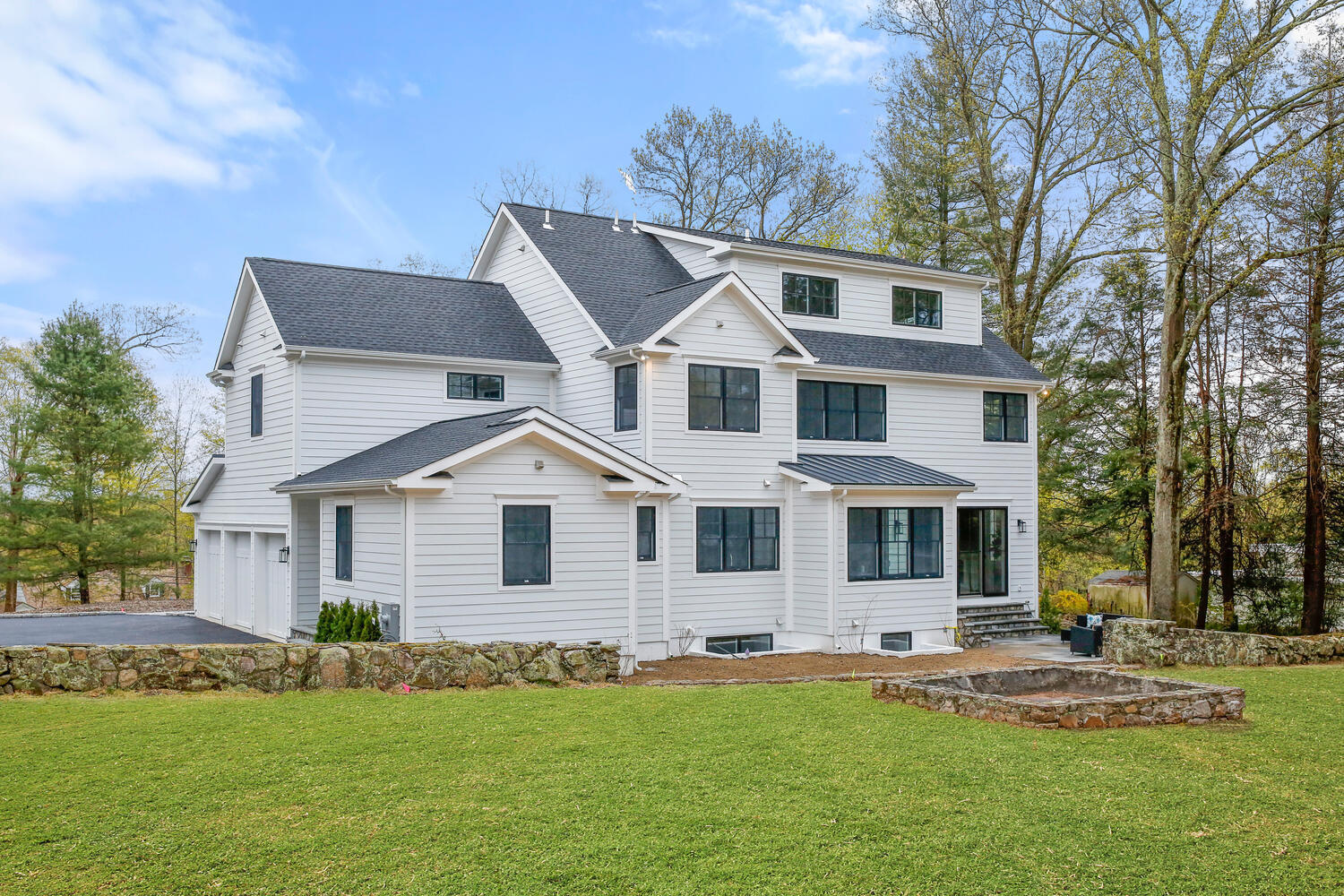 12 Cottontail Road Cos Cob, CT 06807 - Photo 25 of 35 a front view of a house with a yard