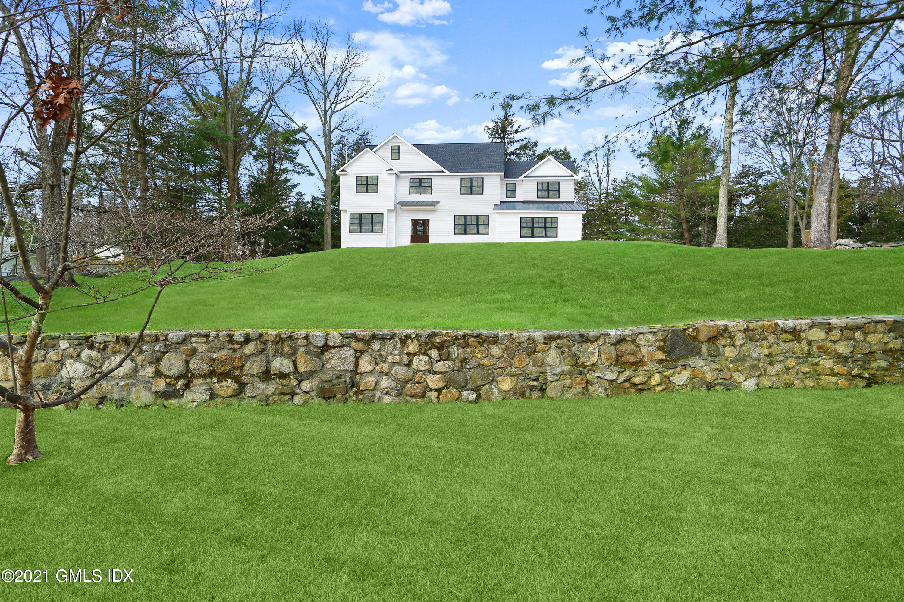 12 Cottontail Road Cos Cob, CT 06807 - Photo 4 of 35 a view of a house with a yard