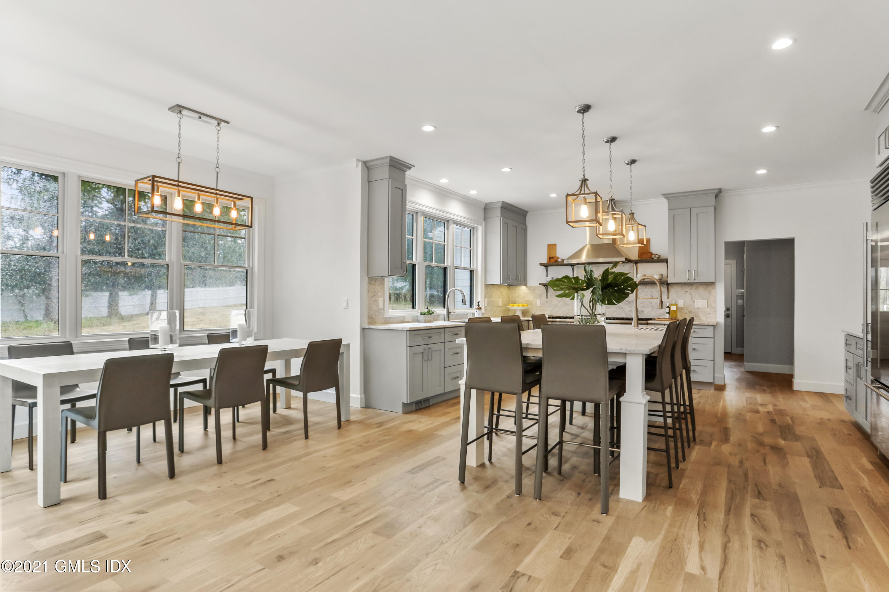 12 Cottontail Road Cos Cob, CT 06807 - Photo 8 of 35 a view of a dining room with furniture window and wooden floor